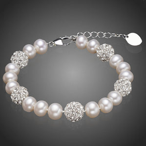 Náramok s bielymi perlami Riccia