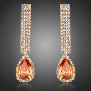 náušnice dlh= s oranžovými zirkónmi