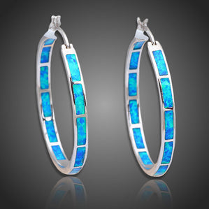 náušnice kruhy s modrým opálom